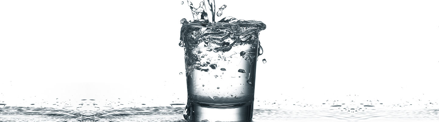 1440 by 400 pixels drinking water banner, water being poured into glass, commercial foodservice